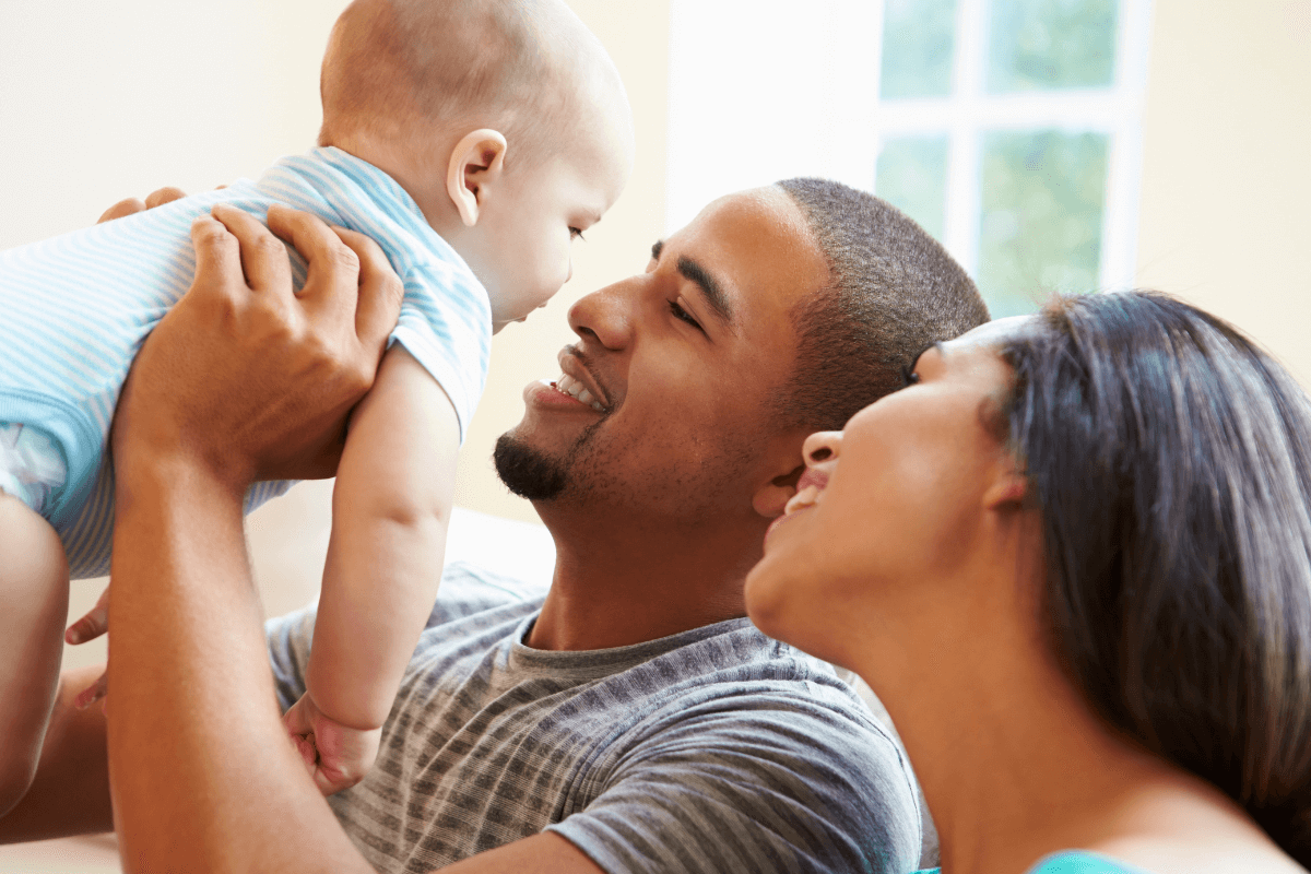 Family holding an infant. Family Law